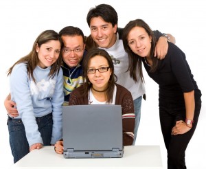 Group of students on a laptop computer